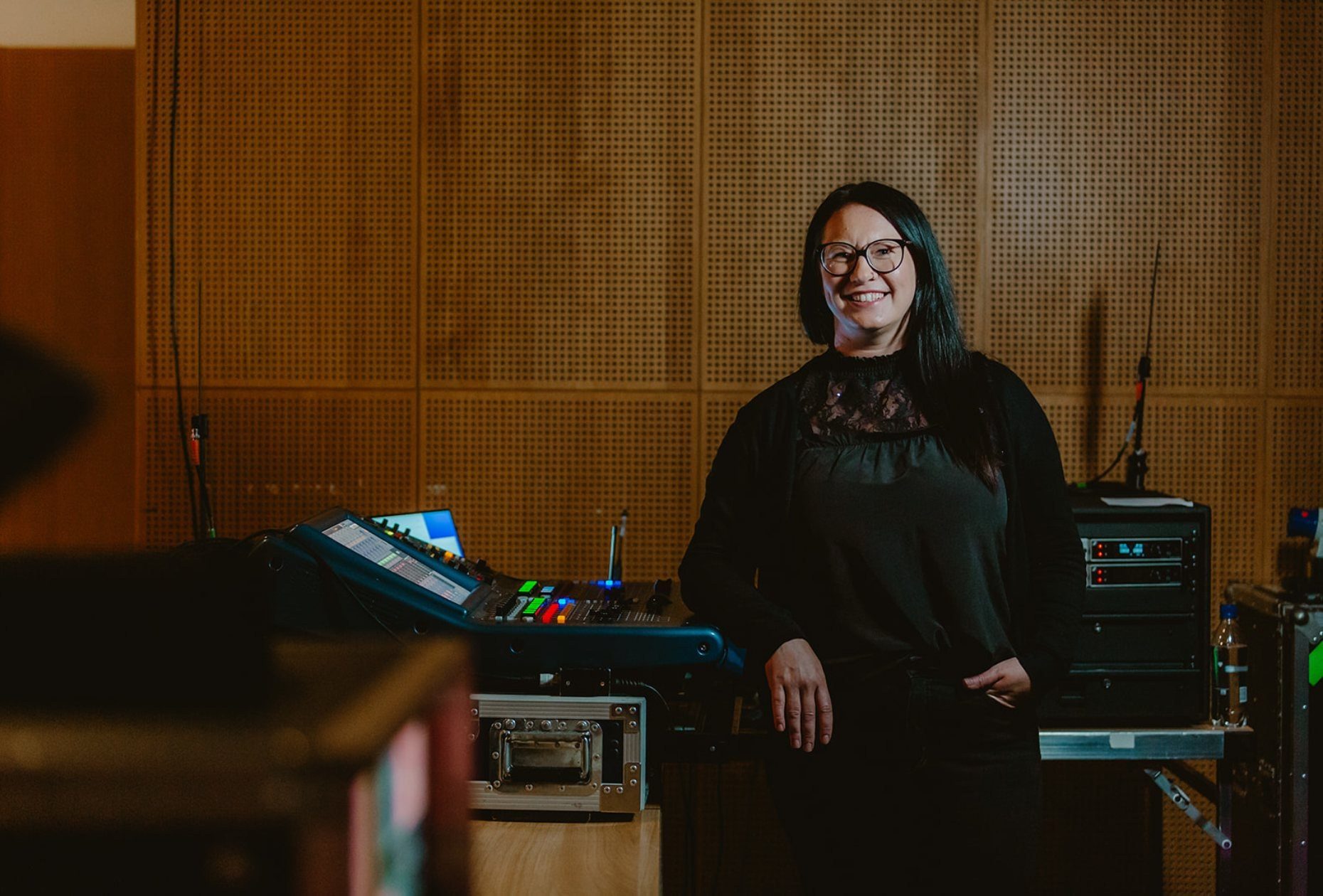 Senior Production Manager, Danielle Reid photographed in Hall 2 in front of production desk