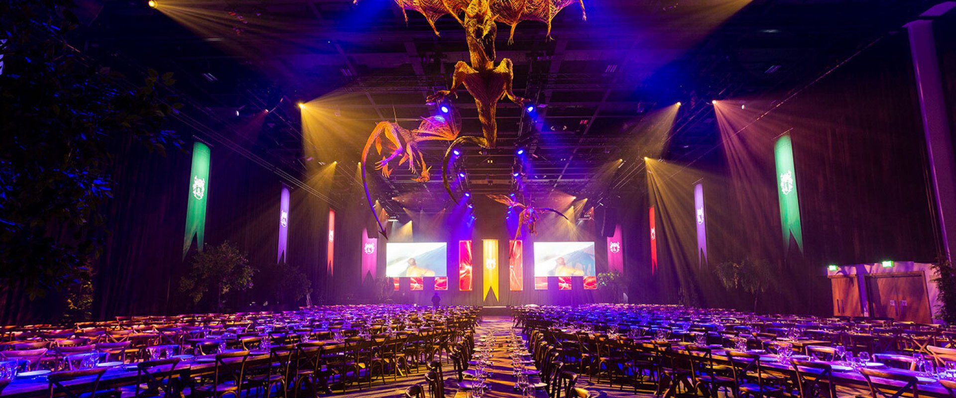 Image showcase AstraZeneca Gala Dinner in Hall 1 with Game of Thrones dragon installation hanging from roof