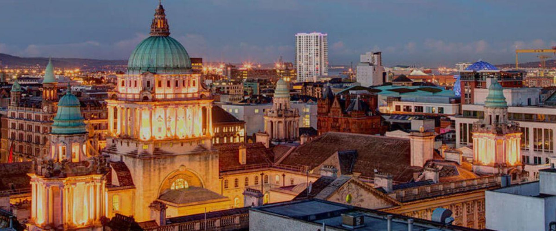 An image of Belfast City Hall skyline lit up