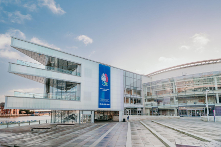 Exterior image of building with blue exterior banner on the side