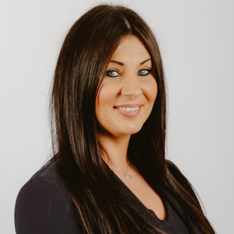 Operations Assistant, Emma Rea photographed with white background