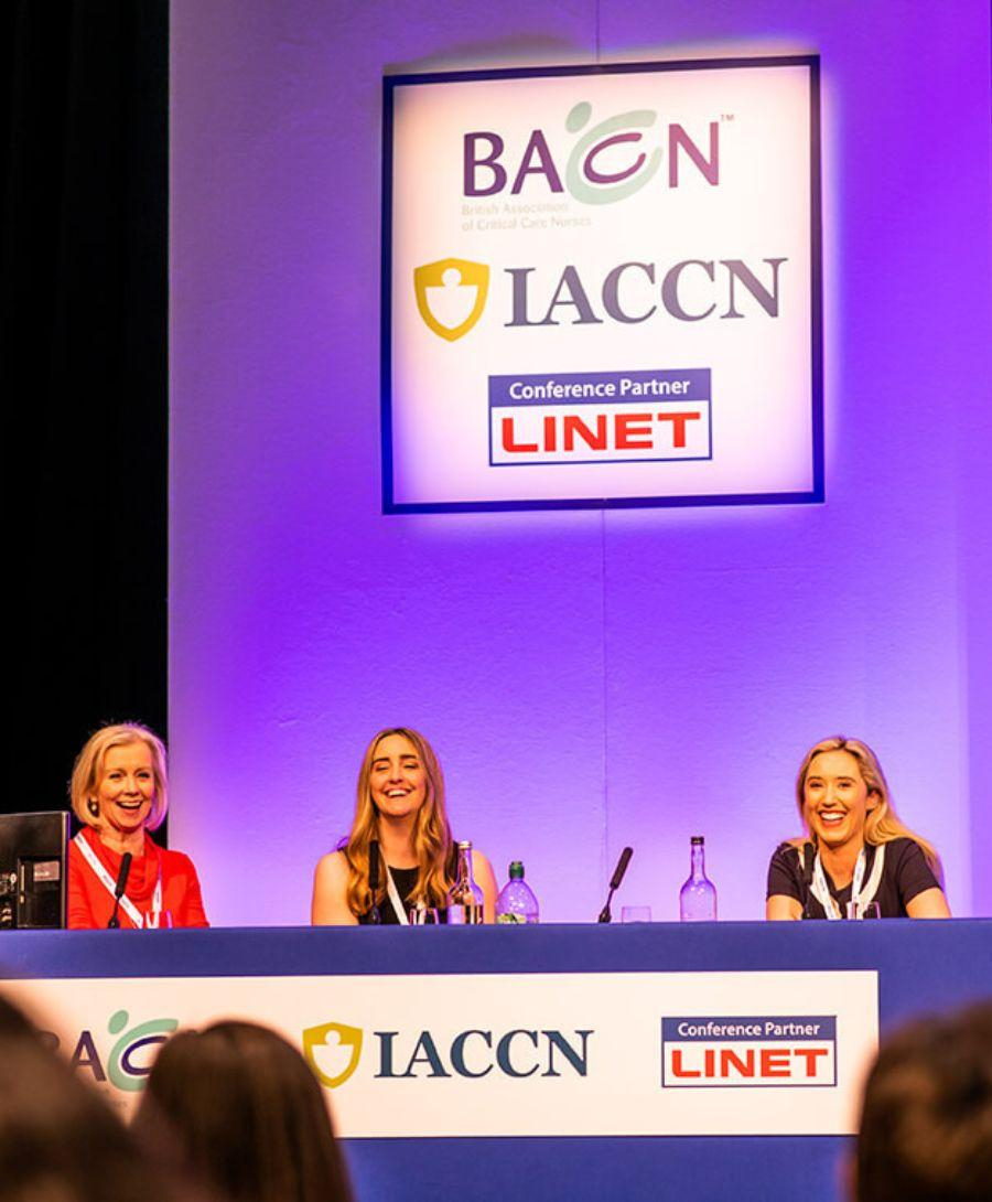 Hall one, panel discussion of four people