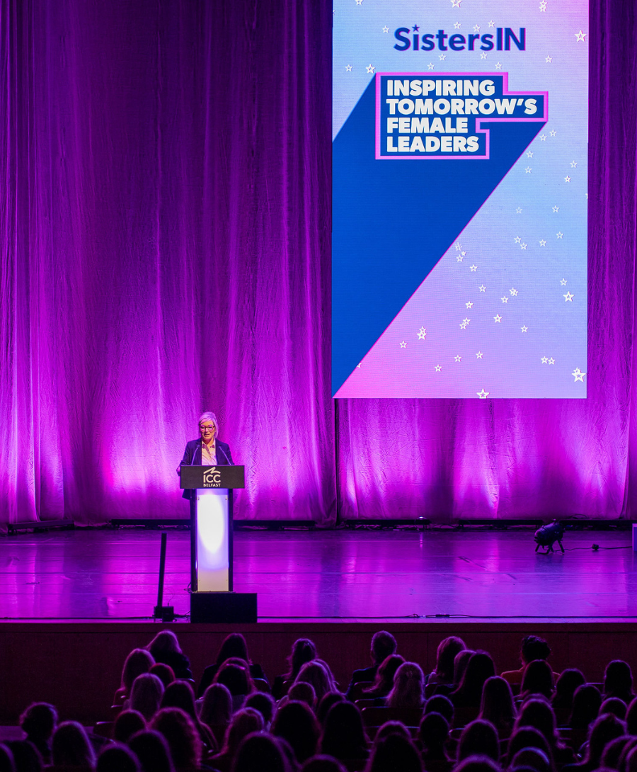 NI First Minister, Michelle O'Neill on stage at the SistersIn Celebration Event 2024 in the Main Auditorium.