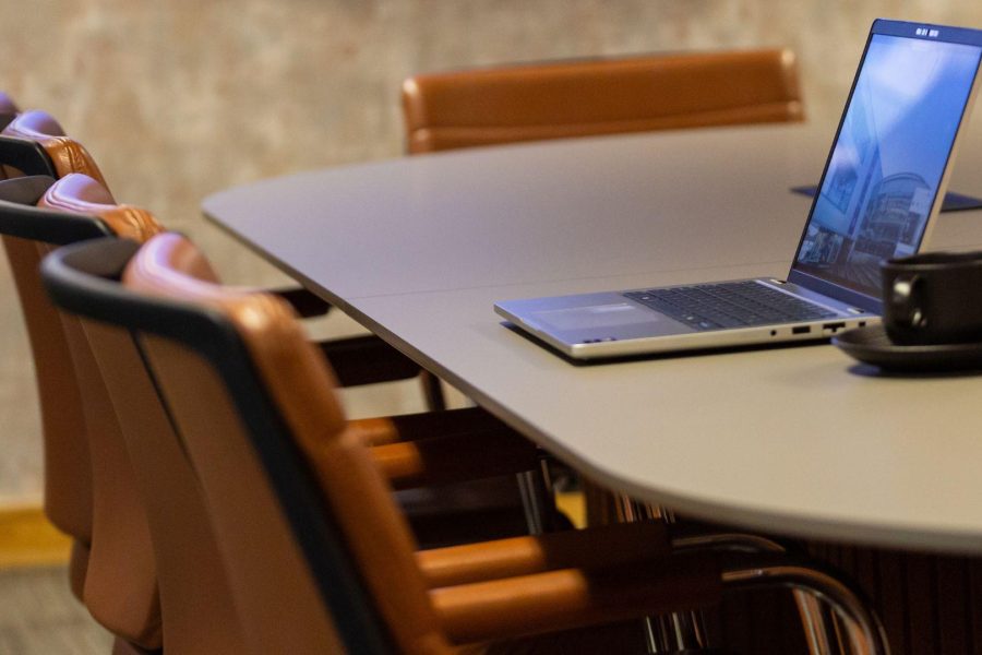 Image of laptop and cup of coffee on desk