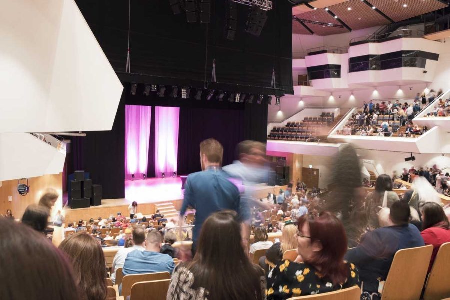 2,000 seat Main Auditorium filled with people facing stage at the front