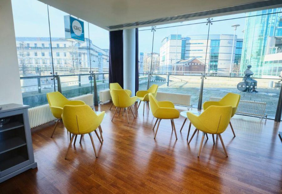 Arc bar set up with yellow armchairs