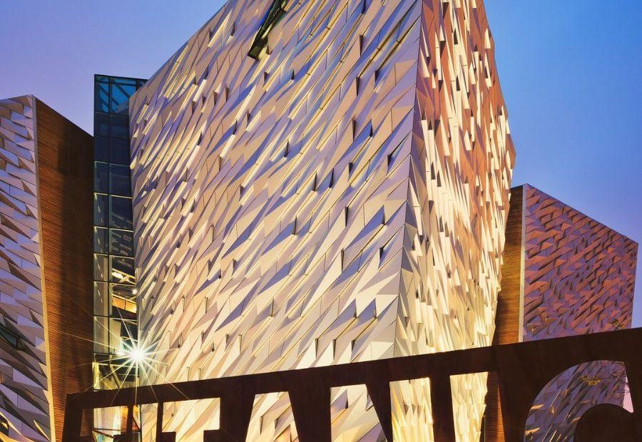 An image of the Titanic Belfast venue lit up at night