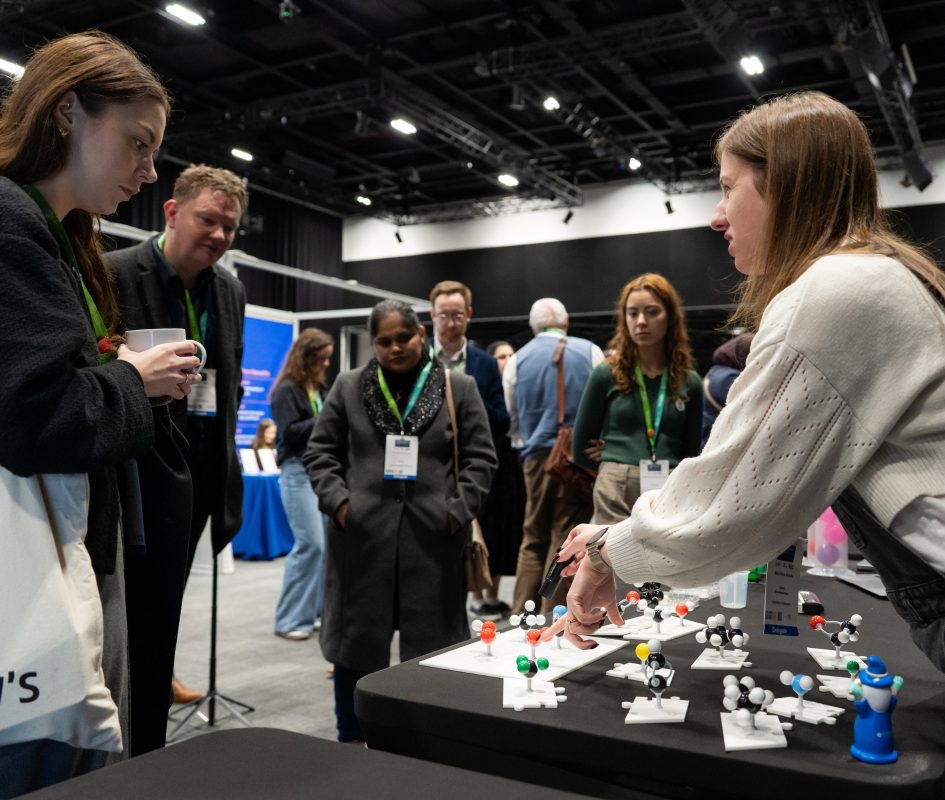 Delegates attending Pharmacology 2025 at ICC Belfast during a large international scientific conference, with keynote presentations, exhibition spaces and networking opportunities for the global pharmacology community.